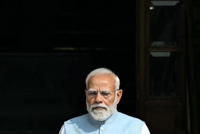 India's Prime Minister Narendra Modi waits for the arrival of Brazil's President Luiz Inacio Lula da Silva at the Hyderabad House in New Delhi on February 21, 2026. (Photo by Sajjad HUSSAIN / AFP)