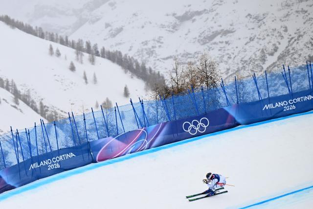Switzerland's Tobias Baur competes in the freestyle skiing men's ski cross seeding during the Milano Cortina 2026 Winter Olympic Games at Livigno Snow Park, in Livigno (Valtellina), on February 21, 2026. (Photo by Kirill KUDRYAVTSEV / AFP)