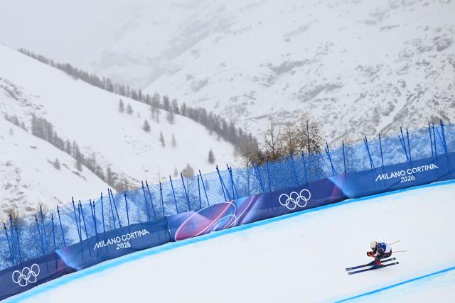Austria's Adam Kappacher competes in the freestyle skiing men's ski cross seeding during the Milano Cortina 2026 Winter Olympic Games at Livigno Snow Park, in Livigno (Valtellina), on February 21, 2026. (Photo by Kirill KUDRYAVTSEV / AFP)