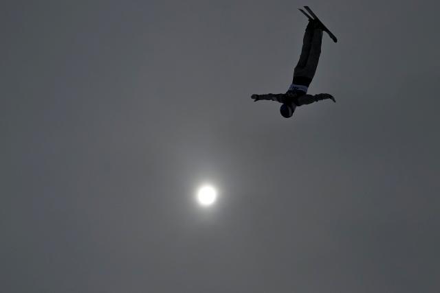Ukraine's Anhelina Brykina competes in the freestyle skiing mixed team aerials final 1 during the Milano Cortina 2026 Winter Olympic Games at Livigno Aerials & Moguls Park, in Livigno (Valtellina), on February 21, 2026. (Photo by Jeff PACHOUD / AFP)