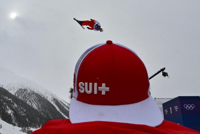 Switzerland's Lina Kozomara competes in the freestyle skiing mixed team aerials final 1 during the Milano Cortina 2026 Winter Olympic Games at Livigno Aerials & Moguls Park, in Livigno (Valtellina), on February 21, 2026. (Photo by Jeff PACHOUD / AFP)