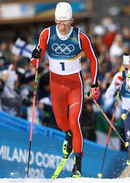Norway's Johannes Hoesflot Klaebo competes during the men's cross country 50km mass start final event of the Milano Cortina 2026 Winter Olympic Games at Tesero Cross-Country Skiing Stadium in Lago di Tesero (Val di Fiemme) on February 21, 2026. (Photo by Anne-Christine POUJOULAT / AFP)