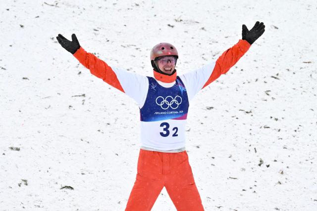 Switzerland's Pirmin Werner reacts in the freestyle skiing mixed team aerials final 2 during the Milano Cortina 2026 Winter Olympic Games at Livigno Aerials & Moguls Park, in Livigno (Valtellina), on February 21, 2026. (Photo by Jeff PACHOUD / AFP)