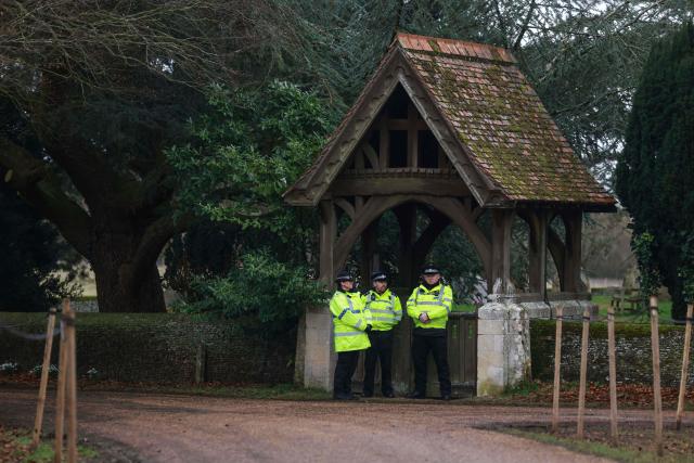 Police stand guard at an entrance to Wood Farm on the royal family's Sandringham Estate in Norfolk, eastern England on February 21, 2026, after Britain's former prince Andrew was arrested on February 19. The British government on February 20 mulled passing a law to remove former prince Andrew from the line of succession, as police stepped up investigations into his conduct, quizzing the disgraced royal's former protection officers. (Photo by Toby Shepheard / AFP)