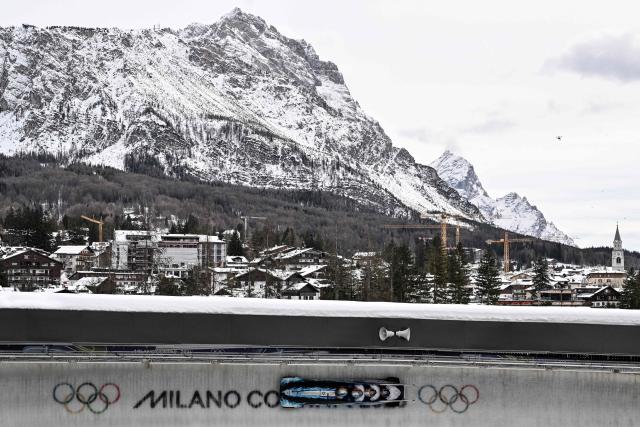 Israel's Adam Edelman, Israel's Menachem Chen, Israel's Uri Zisman and Israel's Omer Katz compete in the bobsleigh men's 4-man heat 2 at Cortina Sliding Centre during the Milano Cortina 2026 Winter Olympic Games in Cortina d'Ampezzo on February 21, 2026. (Photo by Tiziana FABI / AFP)