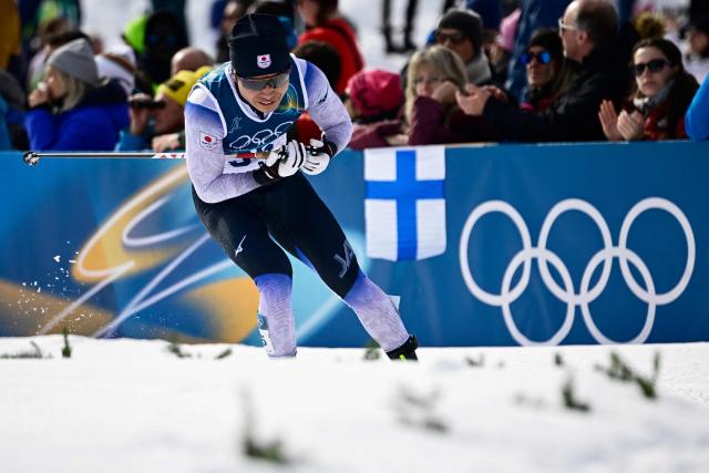 Japan's Ryo Hirose competes during the men's cross country 50km mass start final event of the Milano Cortina 2026 Winter Olympic Games at Tesero Cross-Country Skiing Stadium in Lago di Tesero (Val di Fiemme) on February 21, 2026. (Photo by Tobias SCHWARZ / AFP)