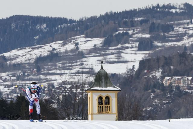 France's Theo Schely competes during the men's cross country 50km mass start final event of the Milano Cortina 2026 Winter Olympic Games at Tesero Cross-Country Skiing Stadium in Lago di Tesero (Val di Fiemme) on February 21, 2026. (Photo by Anne-Christine POUJOULAT / AFP)