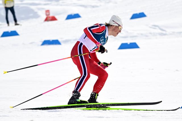 Norway's Johannes Hoesflot Klaebo competes during the men's cross country 50km mass start final event of the Milano Cortina 2026 Winter Olympic Games at Tesero Cross-Country Skiing Stadium in Lago di Tesero (Val di Fiemme) on February 21, 2026. (Photo by Tobias SCHWARZ / AFP)