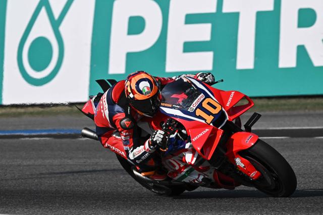 Honda HRC Castrol Italian rider Luca Marini rides on the track during the first day of the 2026 MotoGP pre-season test at the Buriram International Circuit in Buriram on February 21, 2026. (Photo by Lillian SUWANRUMPHA / AFP)