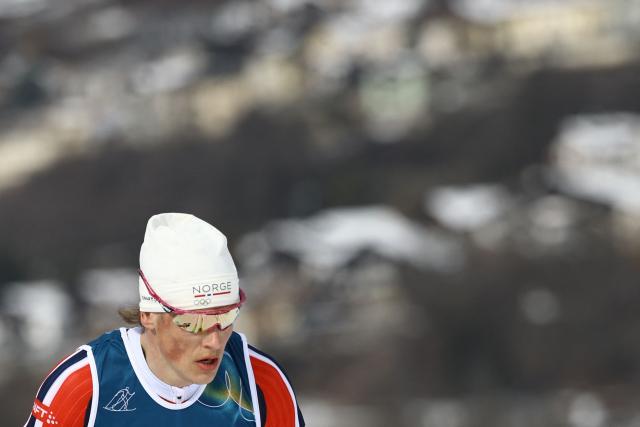 Norway's Johannes Hoesflot Klaebo competes during the men's cross country 50km mass start final event of the Milano Cortina 2026 Winter Olympic Games at Tesero Cross-Country Skiing Stadium in Lago di Tesero (Val di Fiemme) on February 21, 2026. (Photo by Anne-Christine POUJOULAT / AFP)