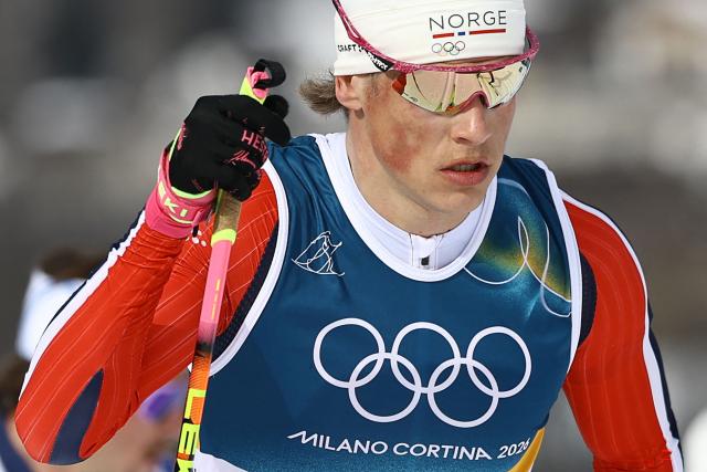 Norway's Johannes Hoesflot Klaebo competes during the men's cross country 50km mass start final event of the Milano Cortina 2026 Winter Olympic Games at Tesero Cross-Country Skiing Stadium in Lago di Tesero (Val di Fiemme) on February 21, 2026. (Photo by Anne-Christine POUJOULAT / AFP)