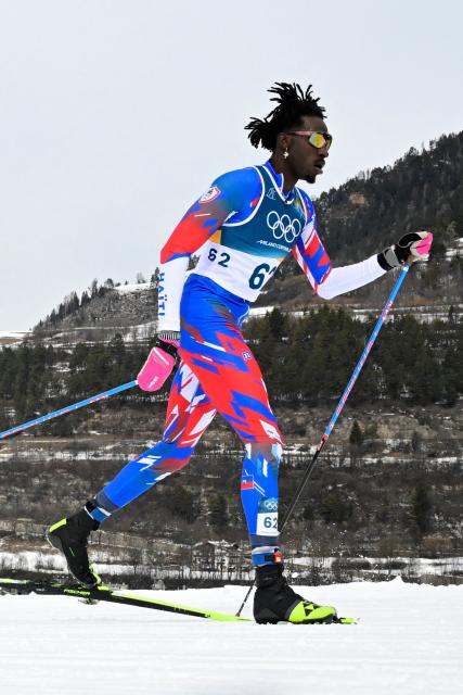 Haiti's Stevenson Savart competes during the men's cross country 50km mass start final event of the Milano Cortina 2026 Winter Olympic Games at Tesero Cross-Country Skiing Stadium in Lago di Tesero (Val di Fiemme) on February 21, 2026. (Photo by Tobias SCHWARZ / AFP)