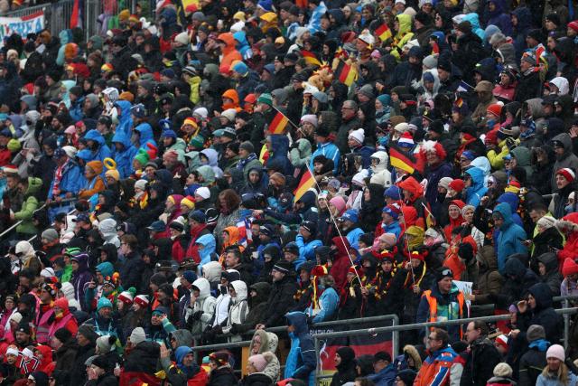 Spectators gather to watch the women's biathlon 12.5km mass start event during the Milano Cortina 2026 Winter Olympic Games at the Anterselva Biathlon Arena (Sudtirol Arena) in Anterselva (Val Pusteria) on February 21, 2026. (Photo by FRANCK FIFE / AFP)