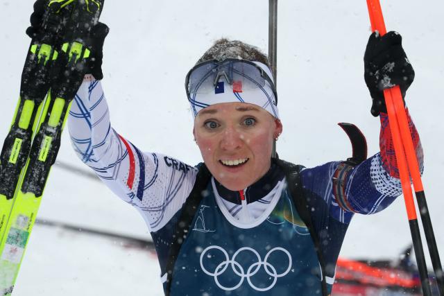 Gold medallist France's Oceane Michelon reacts after crossing the finish line during the women's biathlon 12.5km mass start event during the Milano Cortina 2026 Winter Olympic Games at the Anterselva Biathlon Arena (Sudtirol Arena) in Anterselva (Val Pusteria) on February 21, 2026. (Photo by Odd ANDERSEN / AFP)