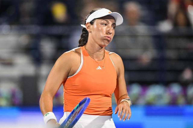 US' Jessica Pegula reacts after a point against Ukraine's Elina Svitolina during their women’s singles final match at the Dubai Duty Free Tennis tournament in Dubai on February 21, 2026. (Photo by Ryan Lim / AFP)