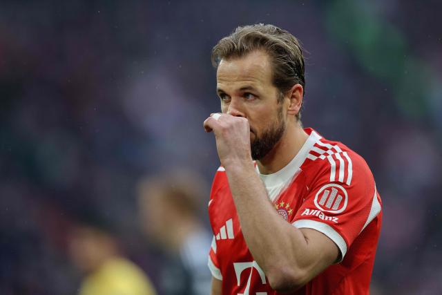 Bayern Munich's English forward #09 Harry Kane reacts during the German first division Bundesliga football match between FC Bayern Munich and Eintracht Frankfurt in Munich, southern Germany, on February 21, 2026. (Photo by Alexandra BEIER / AFP) / DFL REGULATIONS PROHIBIT ANY USE OF PHOTOGRAPHS AS IMAGE SEQUENCES AND/OR QUASI-VIDEO
