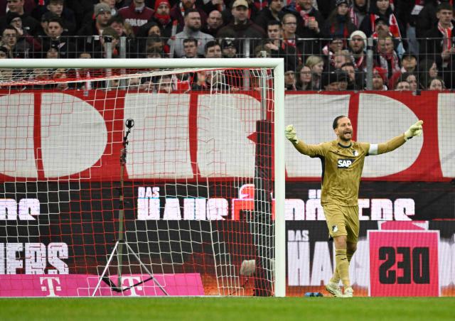 Hoffenheim's German goalkeeper #01 Oliver Baumann reacts during the German first division Bundesliga football match 1 FC Cologne v TSG 1899 Hoffenheim in Cologne, western Germany, on February 21, 2026. (Photo by INA FASSBENDER / AFP) / DFL REGULATIONS PROHIBIT ANY USE OF PHOTOGRAPHS AS IMAGE SEQUENCES AND/OR QUASI-VIDEO