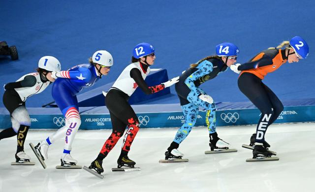 Japan's Ayano Sato, USA's Mia Manganello, Canada's Ivanie Blondin, Kazakhstan's Elizaveta Golubeva and Netherlands' Marijke Groenewoud compete in the speed skating women's mass start final during the Milano Cortina 2026 Winter Olympic Games at Milano Speed Skating Stadium in Milan on February 21, 2026. (Photo by Piero CRUCIATTI / AFP)