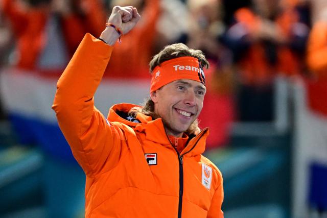 Gold medallist Netherlands' Jorrit Bergsma celebrates on the podium of the speed skating men's mass start final during the Milano Cortina 2026 Winter Olympic Games at Milano Speed Skating Stadium in Milan on February 21, 2026. (Photo by Piero CRUCIATTI / AFP)