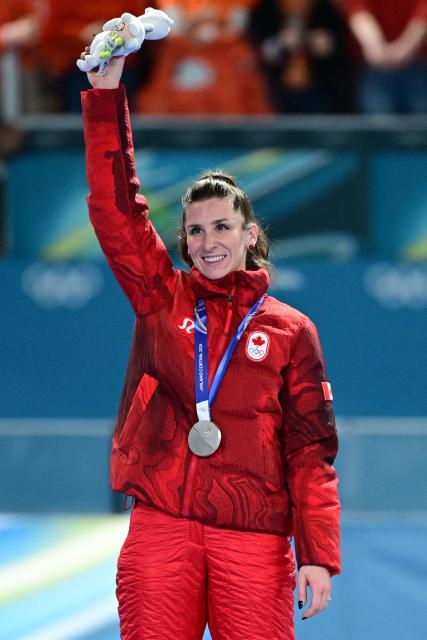 Silver medallist Canada's Ivanie Blondin poses on the podium of in the speed skating women's mass start final during the Milano Cortina 2026 Winter Olympic Games at Milano Speed Skating Stadium in Milan on February 21, 2026. (Photo by Piero CRUCIATTI / AFP)