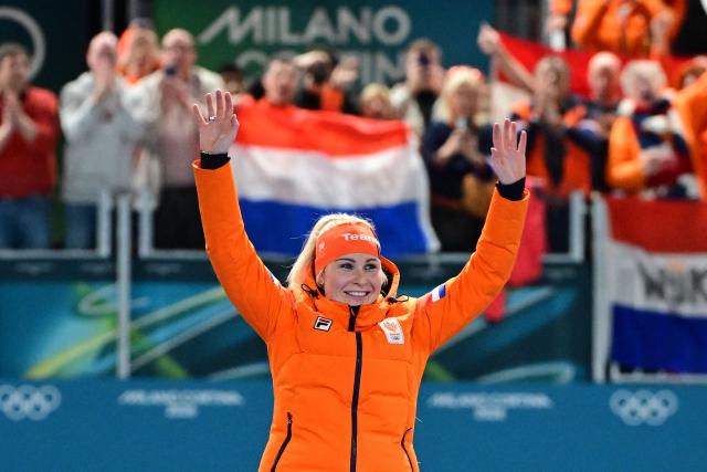 Gold medallist Netherlands' Marijke Groenewoud poses on the podium of in the speed skating women's mass start final during the Milano Cortina 2026 Winter Olympic Games at Milano Speed Skating Stadium in Milan on February 21, 2026. (Photo by Piero CRUCIATTI / AFP)