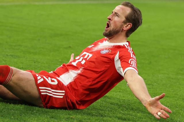 Bayern Munich's English forward #09 Harry Kane celebrates scoring the 3-0 goal during the German first division Bundesliga football match between FC Bayern Munich and Eintracht Frankfurt in Munich, southern Germany, on February 21, 2026. (Photo by Alexandra BEIER / AFP) / ALTERNATE CROP