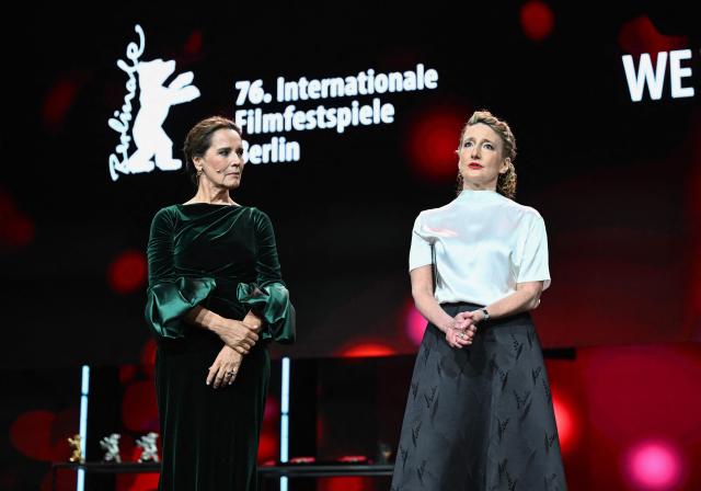 Luxembourgish actress and TV host Desiree Nosbusch and Berlinale director Tricia Tuttle (R) open the Award Ceremony of the 76th Berlinale, Europe's first major film festival of the year, in Berlin on February 21, 2026. The 76th Berlin Film Festival draws to a close after 10 days, with 22 films in competition. (Photo by RALF HIRSCHBERGER / AFP)