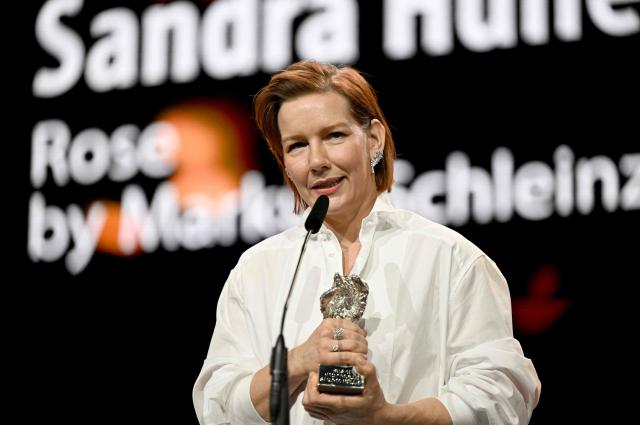 German actress Sandra Hueller accepts the Silver Bear for Best Leading Performance during the Award Ceremony of the 76th Berlinale, Europe's first major film festival of the year, in Berlin on February 21, 2026. The 76th Berlin Film Festival draws to a close after 10 days, with 22 films in competition. (Photo by RALF HIRSCHBERGER / AFP)