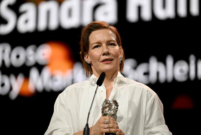 German actress Sandra Hueller accepts the Silver Bear for Best Leading Performance during the Award Ceremony of the 76th Berlinale, Europe's first major film festival of the year, in Berlin on February 21, 2026. The 76th Berlin Film Festival draws to a close after 10 days, with 22 films in competition. (Photo by RALF HIRSCHBERGER / AFP)