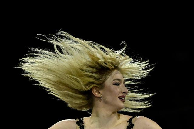 TOPSHOT - USA's Amber Glenn performs at the figure skating exhibition gala during the Milano Cortina 2026 Winter Olympic Games at Milano Ice Skating Arena in Milan on February 21, 2026. (Photo by WANG Zhao / AFP)