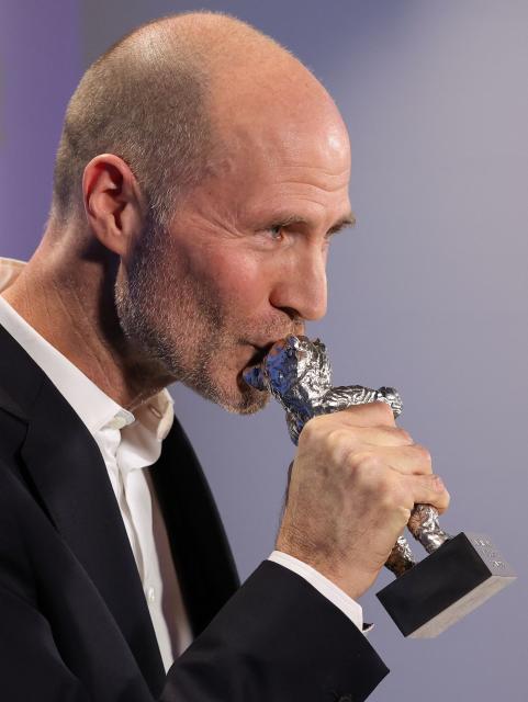 US director Lance Hammer poses during a photocall after winning the Silver Bear Jury Prize for the movie "Queen at Sea" at the 76th Berlinale, Europe's first major film festival of the year, in Berlin on February 21, 2026. The 76th Berlin Film Festival draws to a close after 10 days, with 22 films in competition. (Photo by Ronny HARTMANN / POOL / AFP)