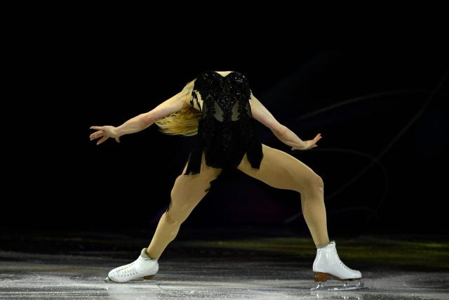 TOPSHOT - USA's Amber Glenn performs at the figure skating exhibition gala during the Milano Cortina 2026 Winter Olympic Games at Milano Ice Skating Arena in Milan on February 21, 2026. (Photo by WANG Zhao / AFP)