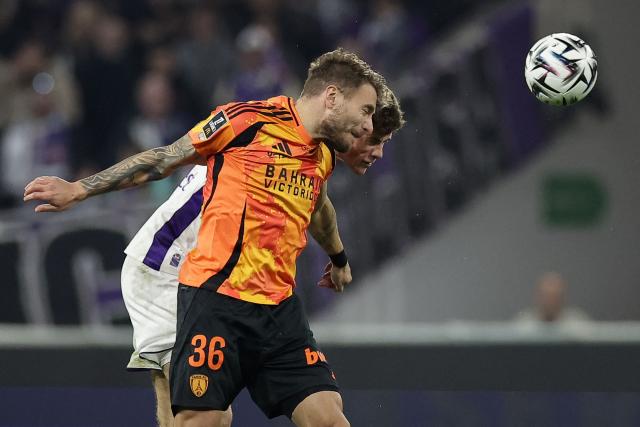 Paris FC's Italian forward #36 Ciro Immobile heads the ball during the French L1 football match between Toulouse FC and Paris FC at the TFC Stadium in Toulouse, southwestern France, on February 21, 2026. (Photo by Valentine CHAPUIS / AFP)