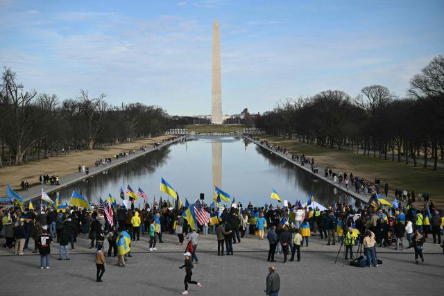 Activists take part in a rally to mark the fourth anniversary of Russia’s war on Ukraine, at the Lincoln Memorial in Washington, DC on February 21, 2026. (Photo (Photo by Mandel NGAN / AFP)