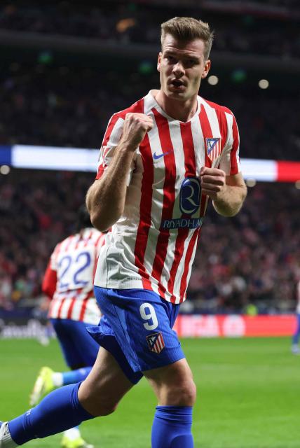 Atletico Madrid's Norwegian forward #09 Alexander Sorloth celebrates an equalizing goal during the Spanish league football match between Club Atletico de Madrid and RCD Espanyol at Metropolitano Stadium in Madrid on February 21, 2026. (Photo by Pierre-Philippe MARCOU / AFP)