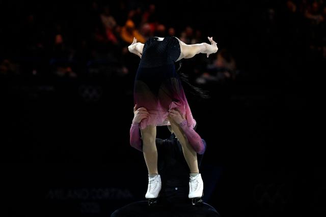 Italy's Marco Fabbri and Charlene Guignard perform at the figure skating exhibition gala during the Milano Cortina 2026 Winter Olympic Games at Milano Ice Skating Arena in Milan on February 21, 2026. (Photo by WANG Zhao / AFP)