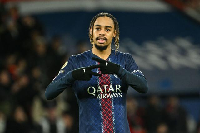 TOPSHOT - Paris Saint-Germain's French forward #29 Bradley Barcola gestures as he celebrates after scoring his team's second goal during the French L1 football match between Paris Saint-Germain (PSG) and FC Metz at the Parc des Princes stadium in Paris on February 21, 2026. (Photo by Bertrand GUAY / AFP)