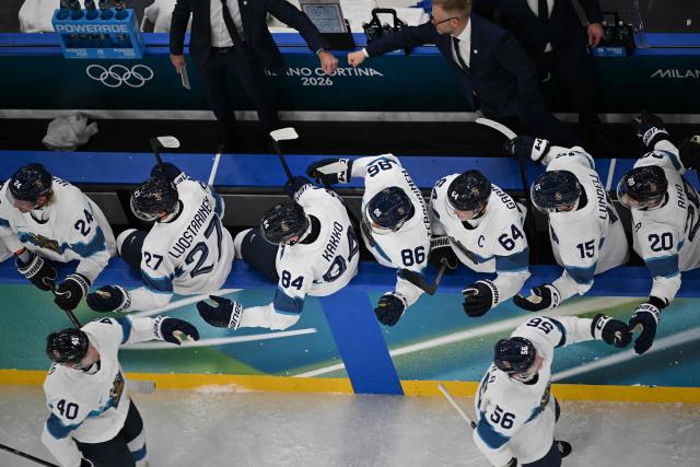 Finland's #56 Erik Haula celebrates with teammates after scoring his team's second goal during the men's bronze medal ice hockey match between Slovakia and Finland at the Milano Santagiulia Ice Hockey Arena during the Milano Cortina 2026 Winter Olympic Games in Milan, on February 21, 2026. (Photo by Alexander NEMENOV / AFP)