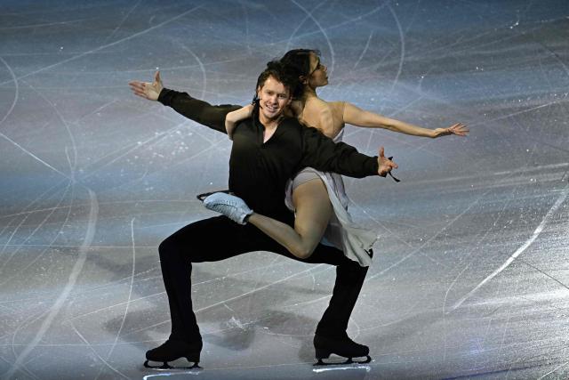 USA's Madison Chock and USA's Evan Bates perform at the figure skating exhibition gala during the Milano Cortina 2026 Winter Olympic Games at Milano Ice Skating Arena in Milan on February 21, 2026. (Photo by Gabriel BOUYS / AFP)