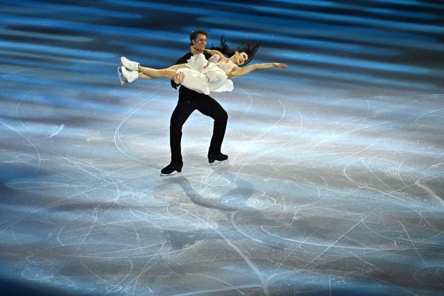 USA's Madison Chock and USA's Evan Bates perform at the figure skating exhibition gala during the Milano Cortina 2026 Winter Olympic Games at Milano Ice Skating Arena in Milan on February 21, 2026. (Photo by Gabriel BOUYS / AFP)
