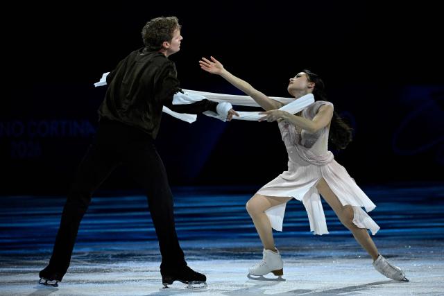 USA's Madison Chock and Evan Bates perform at the figure skating exhibition gala during the Milano Cortina 2026 Winter Olympic Games at Milano Ice Skating Arena in Milan on February 21, 2026. (Photo by WANG Zhao / AFP)