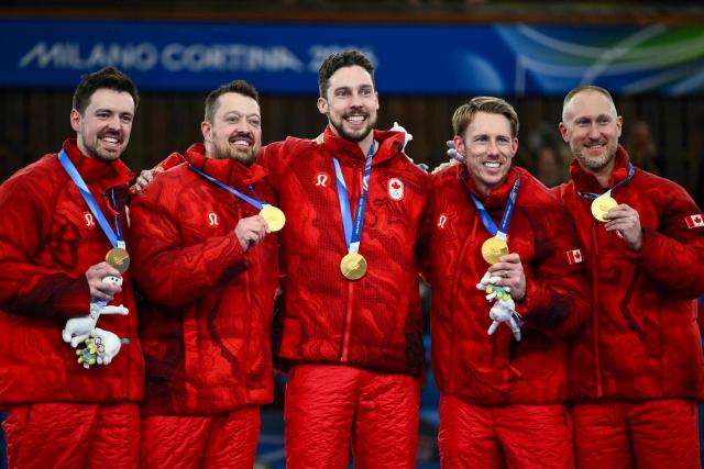 Olympic Champions from L, Canada's Tyler Tardi, Canada's Ben Hebert, Canada's Brett Gallant, Canada's Marc Kennedy and Canada's Brad Jacobs pose with their gold medals at the ceremony during the Milano Cortina 2026 Winter Olympic Games at the Cortina Curling Olympic Stadium in Cortina d’Ampezzo on February 21, 2026. (Photo by Marco BERTORELLO / AFP)