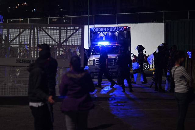 Members of the Venezuelan National Police stand guard outside of the Bolivarian National Police (PNB) Zone 7 prison in Caracas on February 21, 2026. More than 1,500 political prisoners in Venezuela have applied for amnesty under a new law, the head of the country's legislature said on February 21, two days after the measure -- enacted under pressure from Washington -- came into effect. (Photo by Juan BARRETO / AFP)