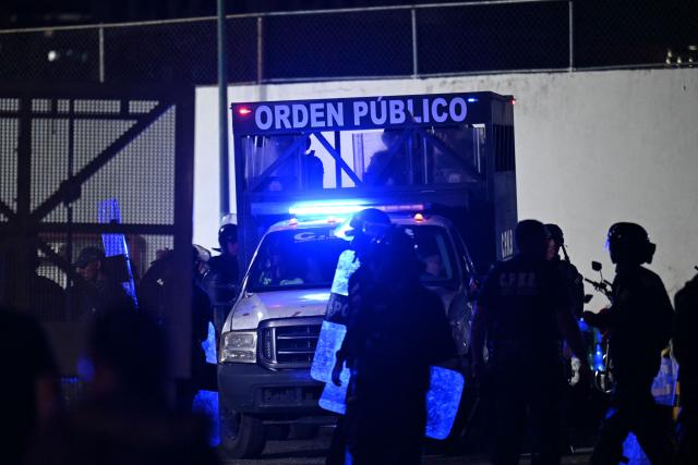 Members of the Venezuelan National Police stand guard outside of the Bolivarian National Police (PNB) Zone 7 prison in Caracas on February 21, 2026. More than 1,500 political prisoners in Venezuela have applied for amnesty under a new law, the head of the country's legislature said on February 21, two days after the measure -- enacted under pressure from Washington -- came into effect. (Photo by Juan BARRETO / AFP)
