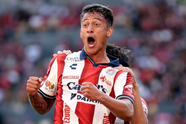 San Luis' defender #31 Eduardo Aguila celebrates scoring his team's second goal during the Liga MX Clausura football match between Atlas and San Luis at the Jalisco Stadium in Guadalajara, state of Jalisco, Mexico, on February 21, 2026. (Photo by Ulises Ruiz / AFP)