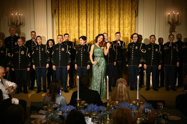 Moldovan violinist Rusanda Panfili performs during a dinner with state governors hosted by US President Donald Trump in the East Room of the White House in Washington, DC, on February 21, 2026. (Photo by Mandel NGAN / AFP)