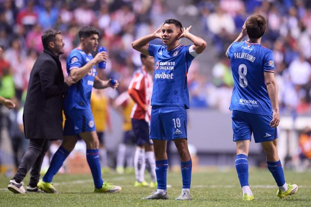TOPSHOT - Cruz Azul's midfielder #19 Carlos Rodriguez celebrates scoring his team's second goal during the Liga MX Clausura football match between Cruz Azul and Guadalajara at the Cuauhtemoc Stadium in Puebla, Mexico on February 21, 2026. (Photo by Jacobo PEREZ / AFP)