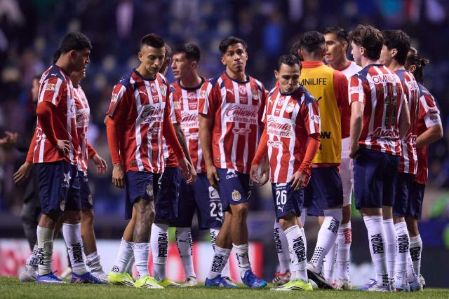 Guadalajara's forward #25 Roberto Alvarado, forward #20 Angel Sepulveda and forward #26 Hugo Camberos react after losing the Liga MX Clausura football match between Cruz Azul and Guadalajara at the Cuauhtemoc Stadium in Puebla, Mexico on February 21, 2026. (Photo by Jacobo PEREZ / AFP)