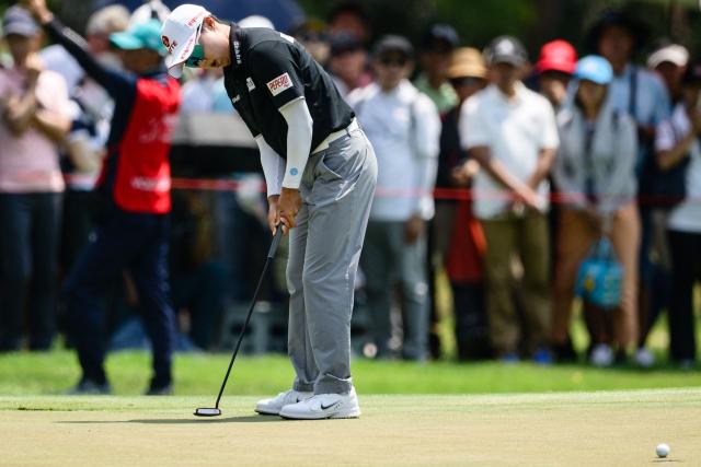 Kim Hyo-joo of South Korea putts the ball during the final day of the 2026 Honda LPGA Thailand golf tournament at the Siam Country Club in Pattaya on February 22, 2026. (Photo by ANTHONY WALLACE / AFP)
