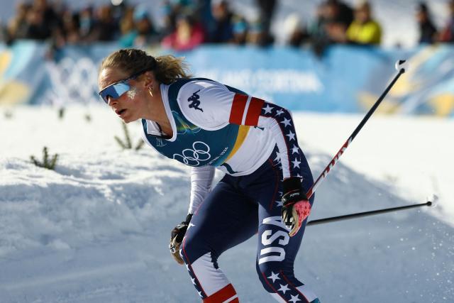 USA's Jessie Diggins competes during the women's cross country 50km mass start final event of the Milano Cortina 2026 Winter Olympic Games at Tesero Cross-Country Skiing Stadium in Lago di Tesero (Val di Fiemme), on February 22, 2026. (Photo by Anne-Christine POUJOULAT / AFP)